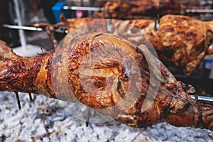 Easter in Greece, process of cooking traditional greek Easter dish - Souvla, grilled lamb, sheep and goat bbq, grilling over