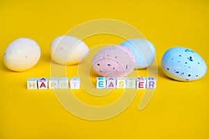 Easter greeting card with painted eggs. Seasonal Easter message Happy easter. Pastel and colorful decorated easter eggs