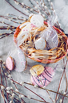 Easter holiday decoration. Egg shaped cookies with frosting and