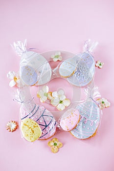 Easter holiday decoration. Egg shaped cookies with frosting