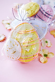 Easter holiday decoration. Egg shaped cookies with frosting