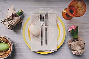 Easter holiday dinner at home. Table setting top view.