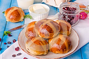 Easter hot cross buns with dried cranberries and raisins