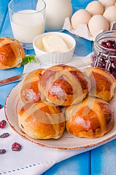 Easter hot cross buns with dried cranberries and raisins