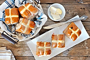 Easter Hot Cross Buns, overhead scene on rustic wood photo