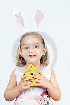 Easter kid holding birds house