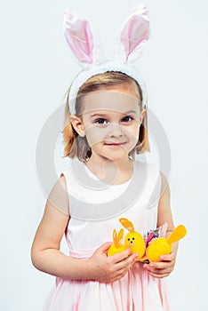 Easter kid holding egg decoration