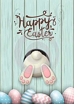 Easter motive, bunny bottom and easter eggs in fresh grass on blue wooden background, illustration