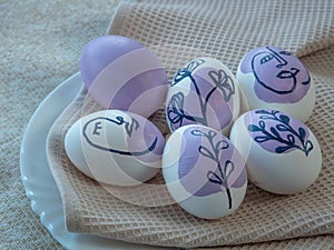 Easter painted eggs, creative purple pattern.