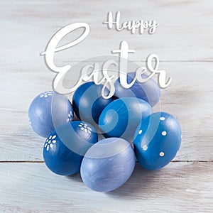 Easter painted eggs and hand lettering text