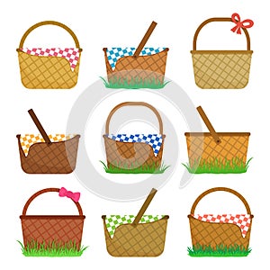 Easter or picnic baskets, set of straw baskets on the grass and with colorful checkered tablecloth. Vector