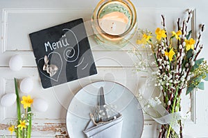 Easter place setting on white vintage table