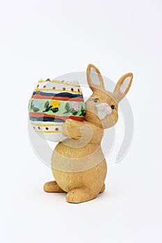 Easter rabbit with egg of clay