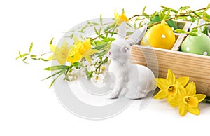 Easter rabbit eggs spring flowers narcissus