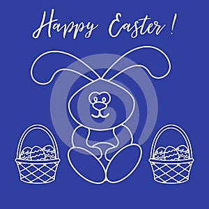 Easter rabbit and two baskets of decorated eggs