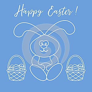 Easter rabbit and two baskets of decorated eggs