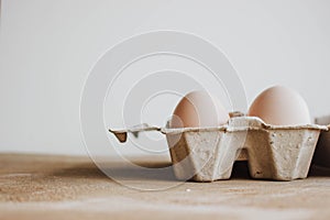 Easter raff egg. Minimal Easter concept. Craft hipster holiday package, carton box