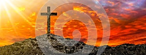 Easter or Religion background banner panorama religious greeting card - Old ruine stone wall and cross in the sunset, with orange