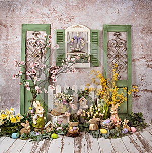 Easter Romantic decorations with greenery and pink and yellow flowers, romantic mood