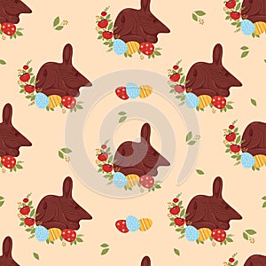 Easter Seamless pattern with chocolate bilby. Cute Australian animal with paschal egg and flowers on beige peach