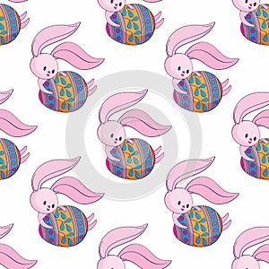 Easter seamless pattern with cute bunnies and colored eggs.