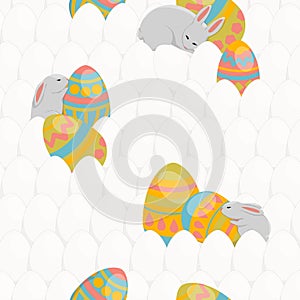 Easter seamless pattern. Little cute rabbit sleeps near a decorated easter egg. Background of white eggs.