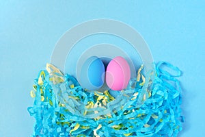 Easter set of colored eggs on bright blue background Easter holiday decorations photo