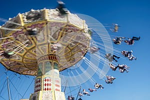 Easter show Carousel spinning people enjoyable time.