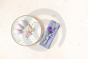 Easter simple table setting. Light pastel colored table setting