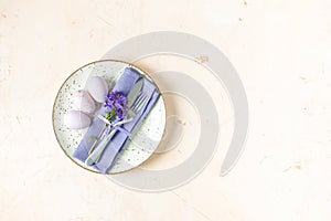 Easter simple table setting. Light pastel colored table setting