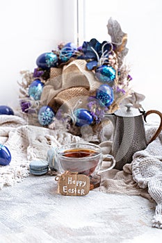 Easter Still life Breakfast with tea and dessert macaroons