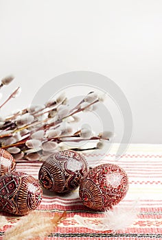 Easter still life with Pysanka on traditional Ukrainian cloth. Decorated Easter eggs, traditional for Eastern Europe culture