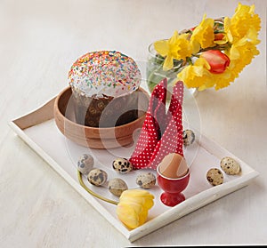 Easter still life with traditional kulich and by the bouquet of