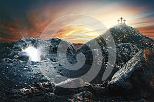 Easter Sunday concept: Empty tomb stone with cross on meadow sunrise background. 3d rendering