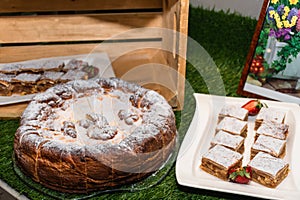 Easter sweet bread Orthodox kulich, paska, rustic wooden background. Easter Holidays breakfast