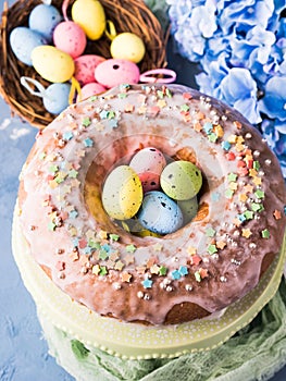 Easter sweet cake with sugar frosting and holiday decor