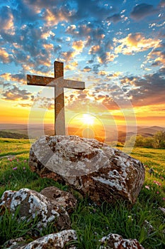 Easter symbolism cross on empty tomb stone at sunrise meadow, concept of good friday