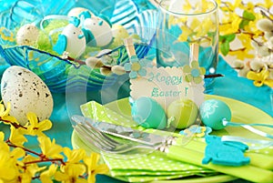 Easter table decoration in pistachio and turquoise colors