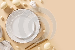 Easter table setting background with white plate, eggs and bunny
