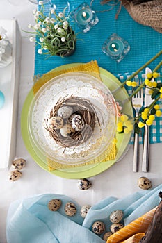 Easter table setting. Cutlery on table. Spring table setting