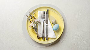 Easter Table Setting with Eggs and Blossoms.