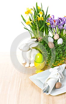 Easter table setting flowers, bunny, eggs decoration