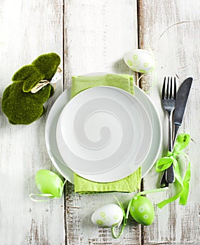 Easter table setting with grass bunny decoration
