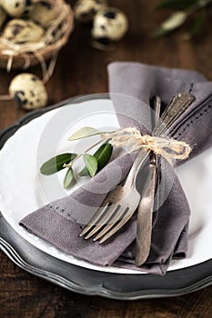 Easter table setting with plate and silverware