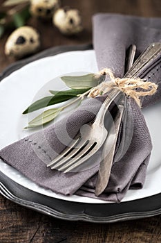 Easter table setting with plate and silverware