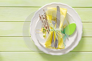 Easter table setting on wood background