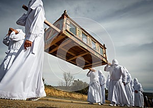 Easter traditional procession in brotherhood with coffin photo