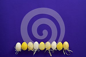 Easter white and yellow plastic decorative eggs