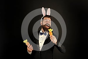 This Easter will be filled with music. Easter bunny sing karaoke song. Using carrot for microphone. Businessman pretend