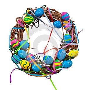 Easter wreath of vines and colored eggs isolated on white background. Festive decor on the door and in the house